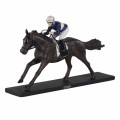 Beeld jockey op renpaard kleur