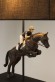 Lamp jumping horse with rider