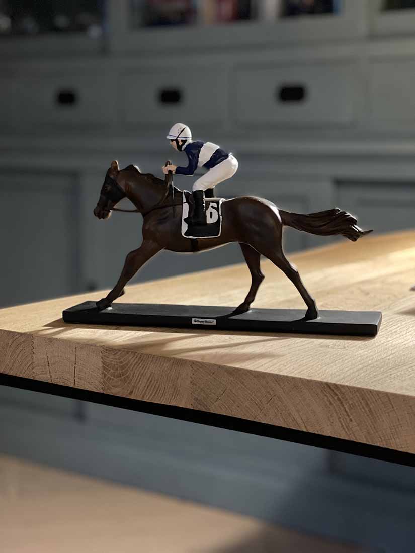 sculpture jockey on racehorse in color